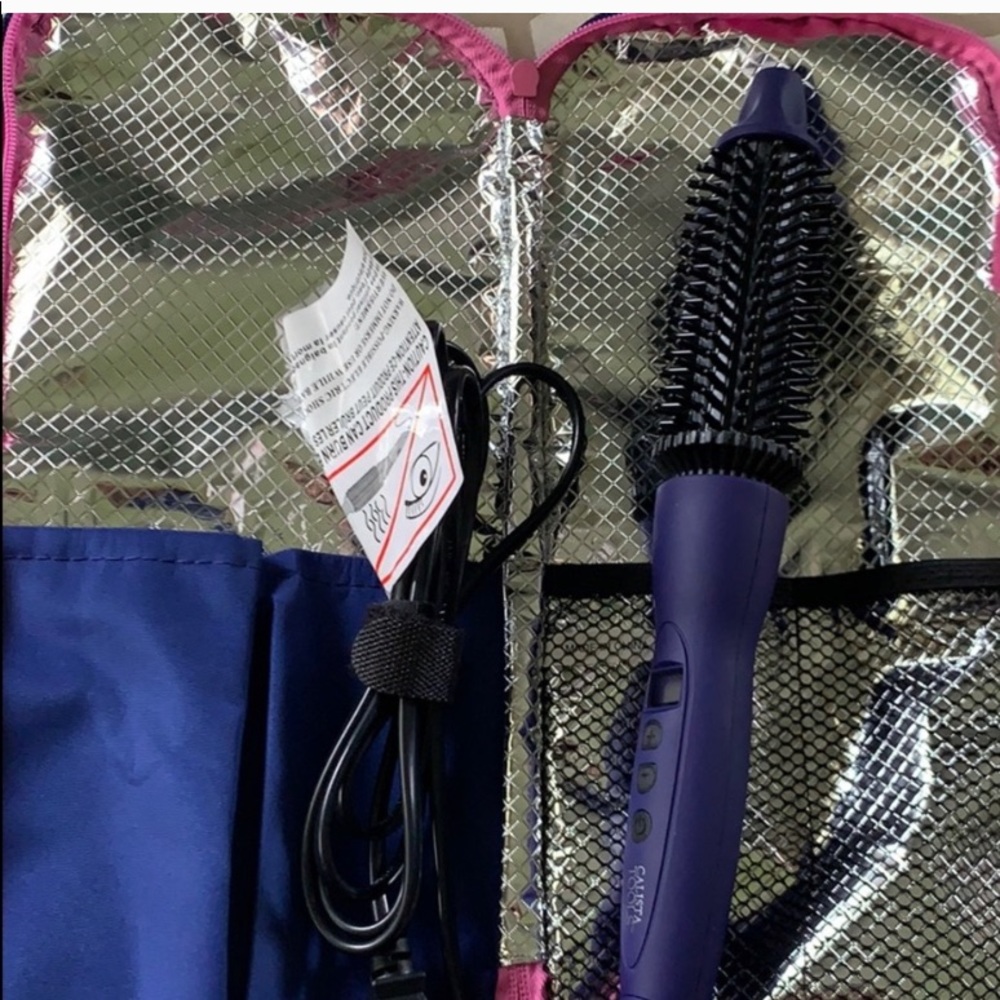 Ceramic heated round brush for use on dry hair.